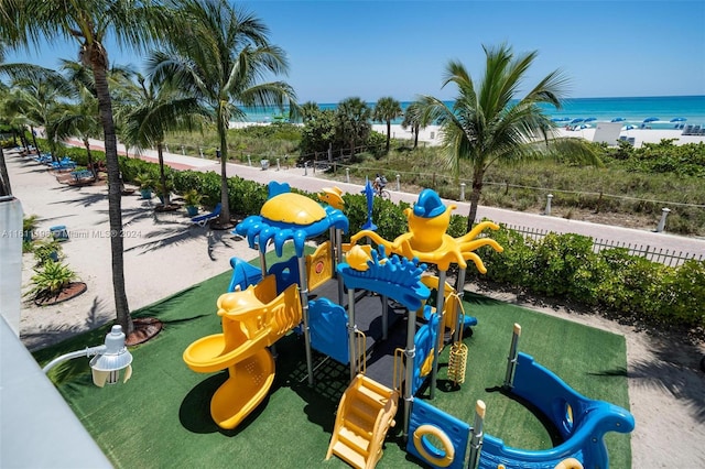 view of play area with a water view