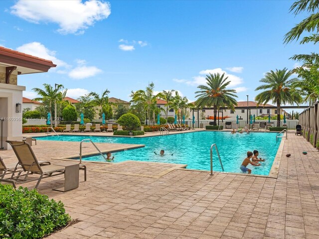 view of swimming pool featuring a patio