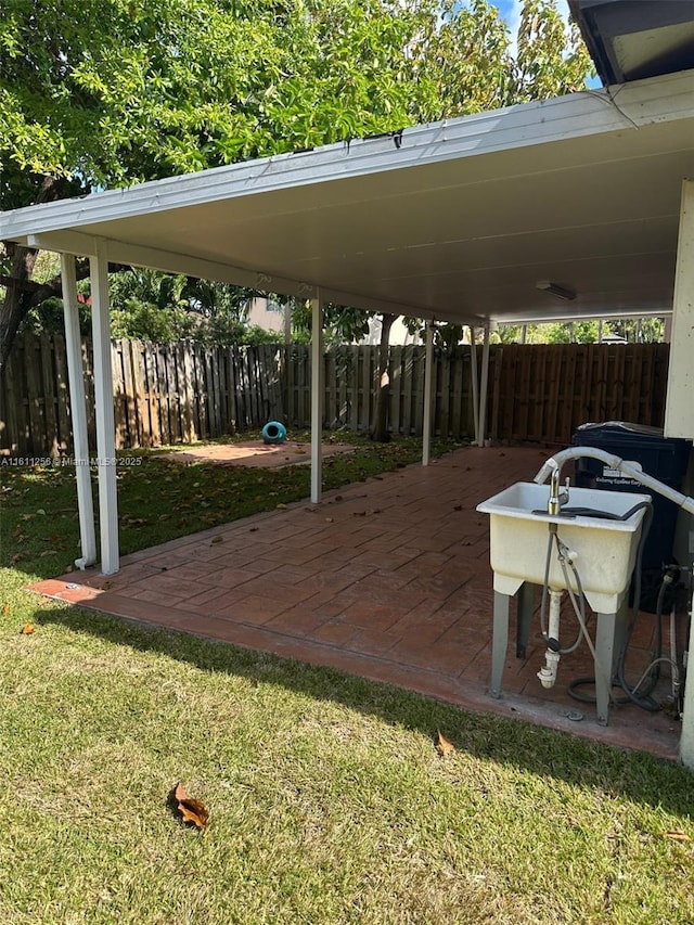 21532 SW 88th Pl, Cutler Bay, FL 33189 - view of car parking featuring a fenced backyard