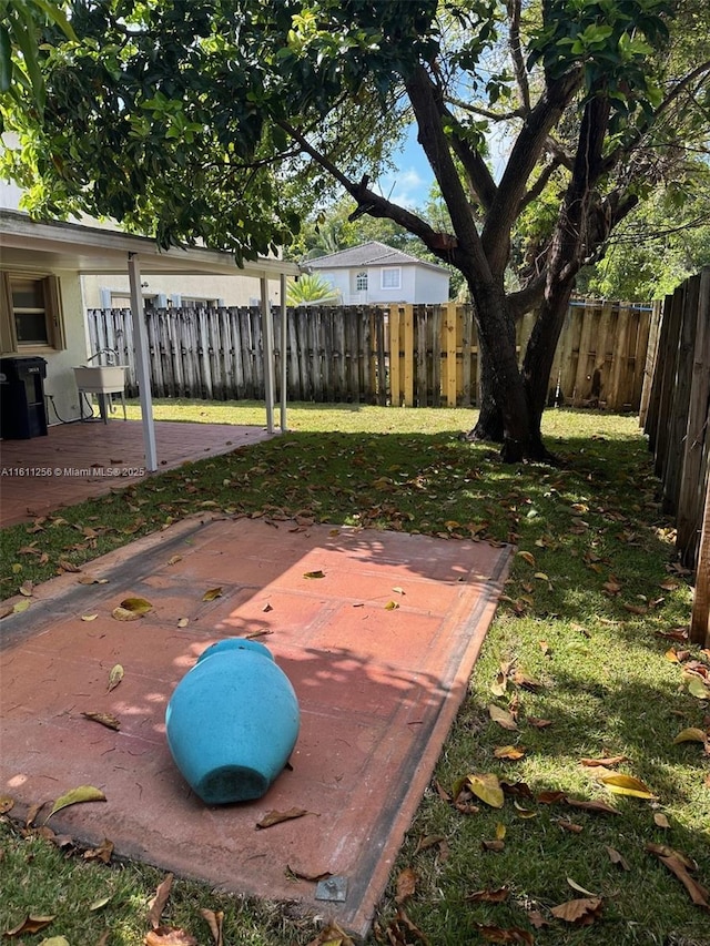 21532 SW 88th Pl, Cutler Bay, FL 33189 - view of yard with a fenced backyard and a deck