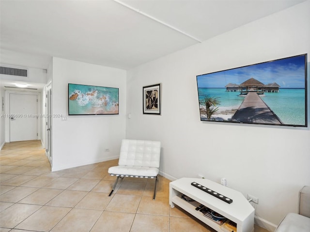 living area with light tile patterned flooring