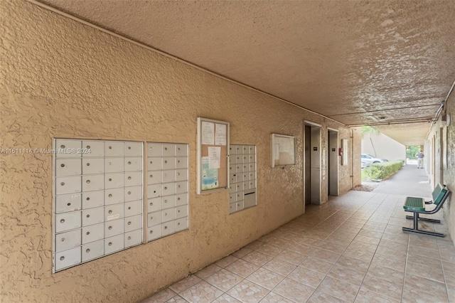 view of property's community with mail boxes