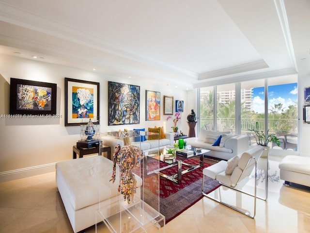 living room with a raised ceiling and light tile patterned floors