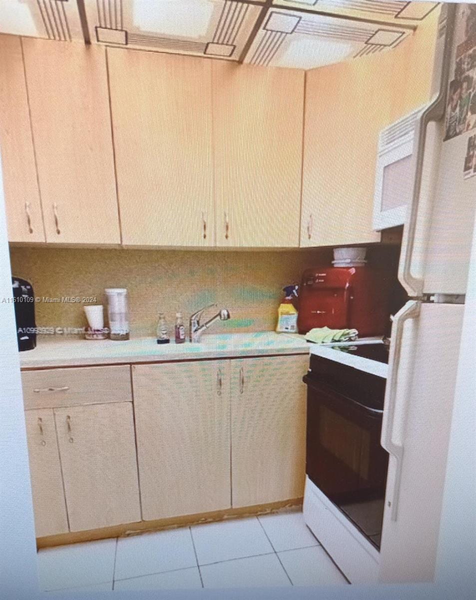 kitchen featuring white appliances