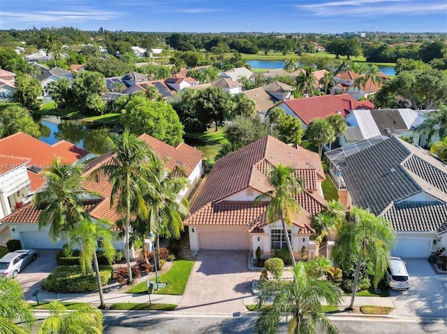 aerial view with a water view and a residential view