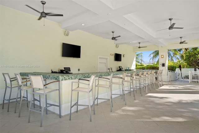 view of swimming pool featuring ceiling fan