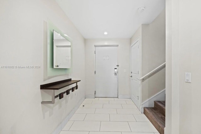 foyer with light tile floors