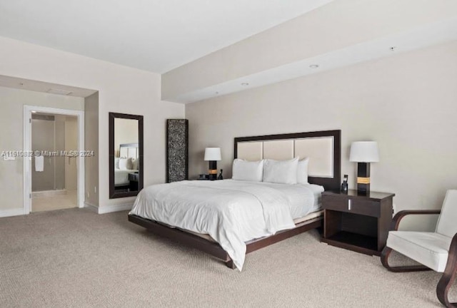 carpeted bedroom with baseboards