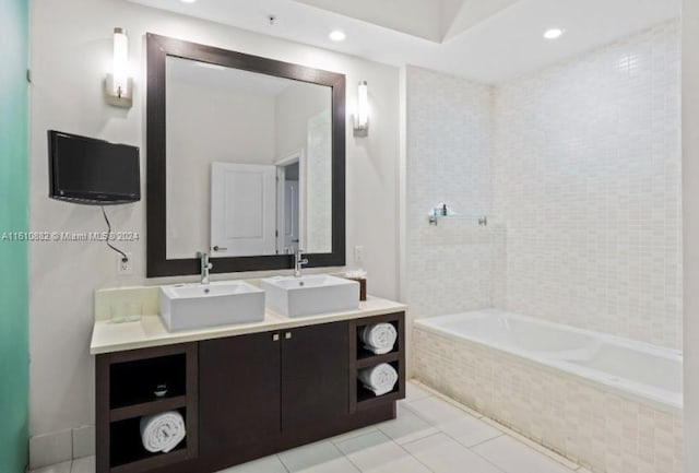 full bathroom with tile patterned flooring, a sink, recessed lighting, and double vanity