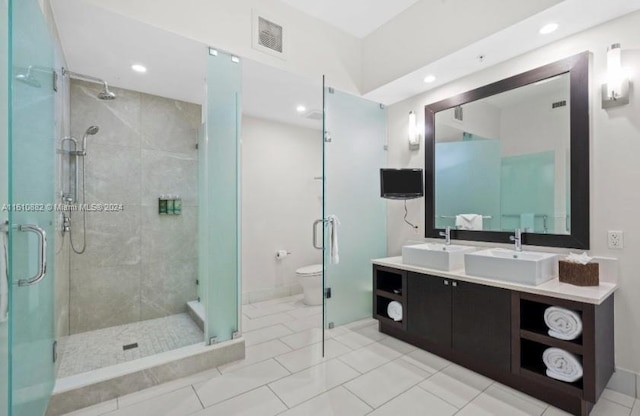 full bath featuring a shower stall and a sink