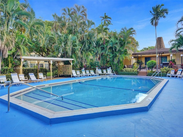 view of swimming pool featuring a patio