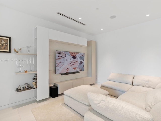 living room featuring light tile floors