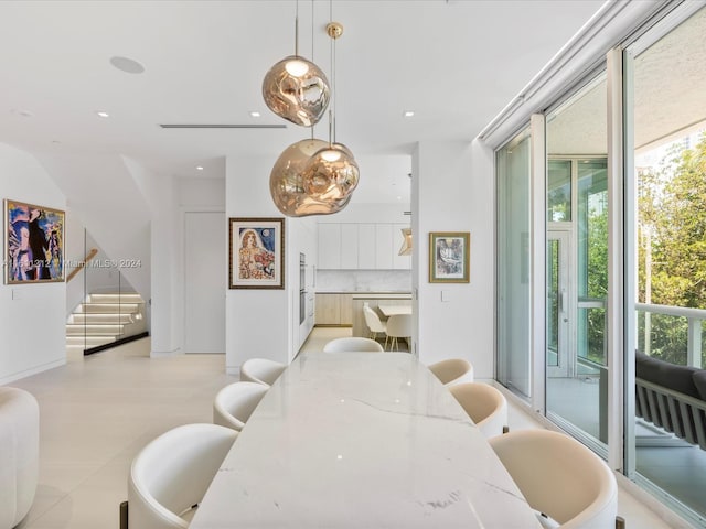 dining room featuring light tile floors