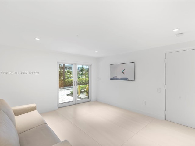 living room featuring light tile floors