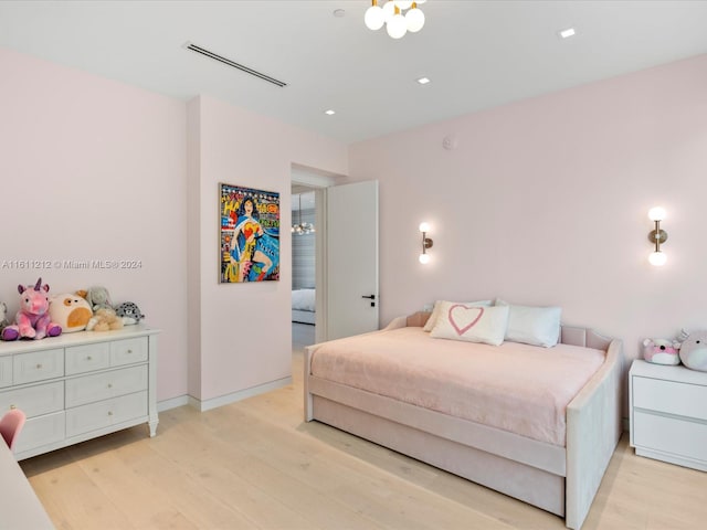 bedroom with light wood-type flooring