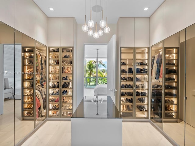 wine room featuring a chandelier