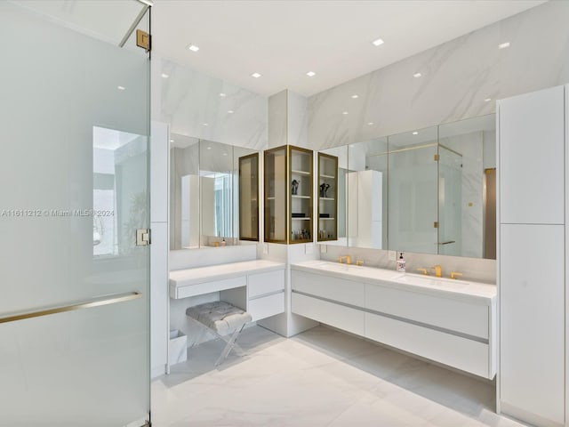 bathroom featuring dual vanity, walk in shower, and tile flooring