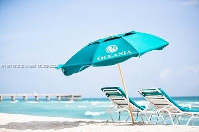 details featuring a beach view and a water view