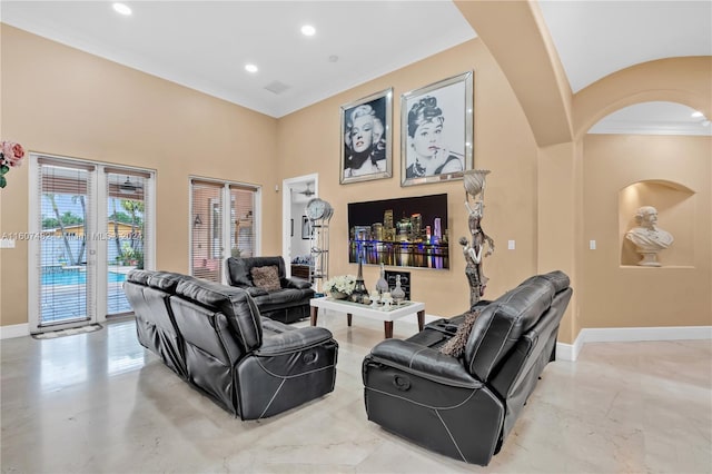 living room with tile floors and crown molding