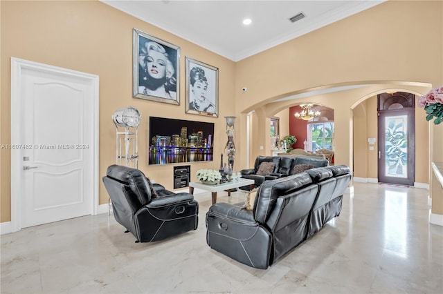 living room with a notable chandelier, tile flooring, and ornamental molding