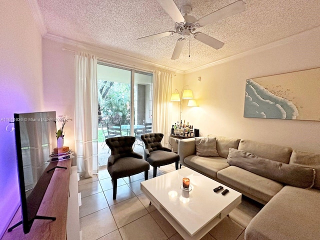 tiled living room with a textured ceiling, ceiling fan, and ornamental molding