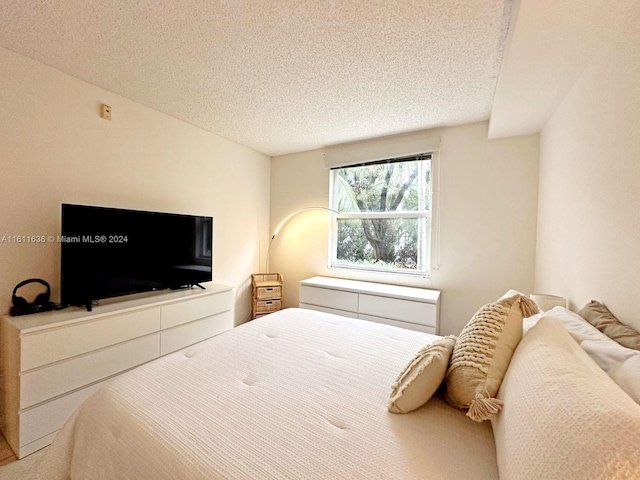 bedroom with a textured ceiling