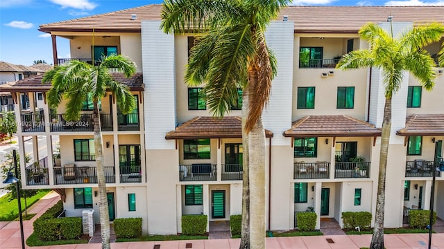 view of property with central AC unit