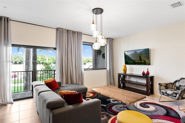 tiled living room with a healthy amount of sunlight