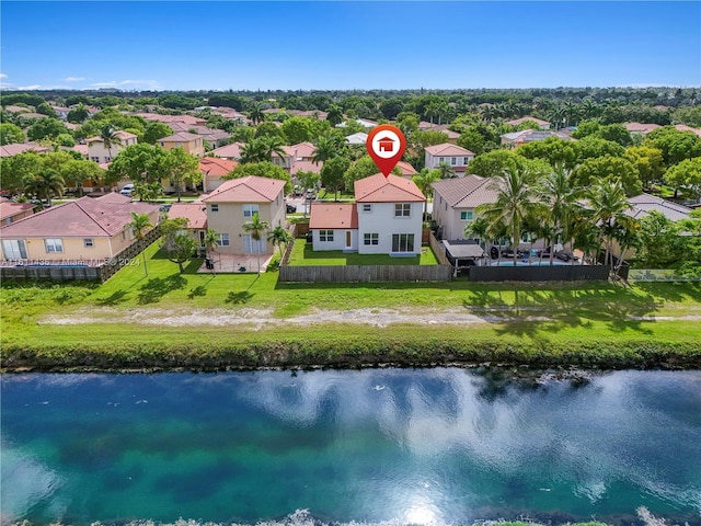 drone / aerial view with a water view