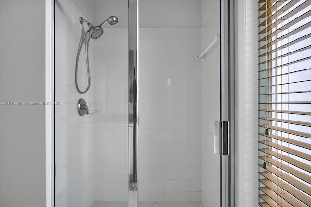 bathroom with an enclosed shower