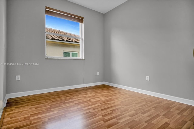 empty room with light wood-type flooring