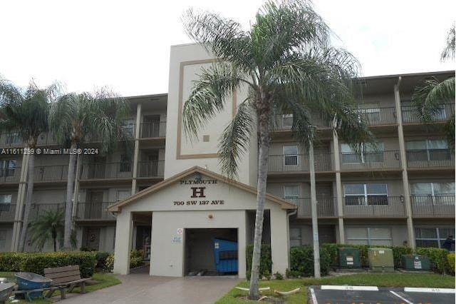 view of building exterior featuring central AC