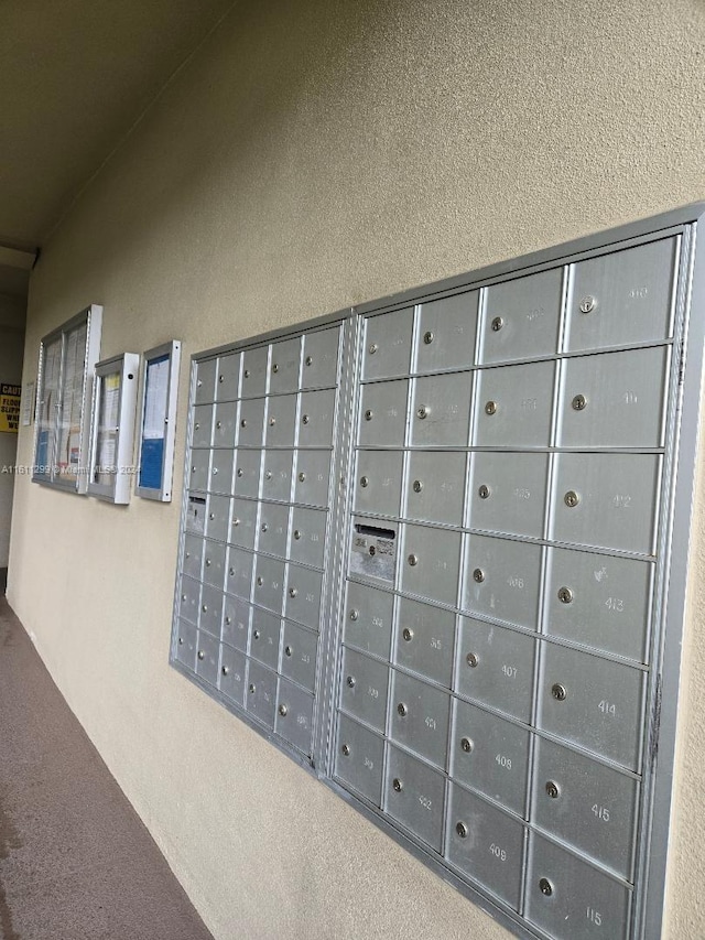 view of property's community with mail boxes