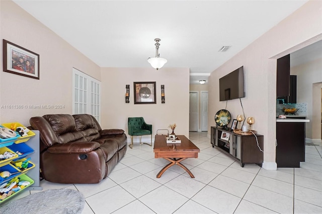 living room with light tile floors