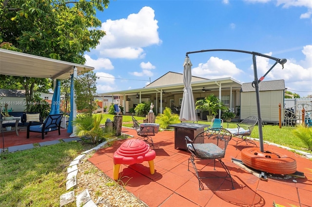 view of terrace featuring a fire pit