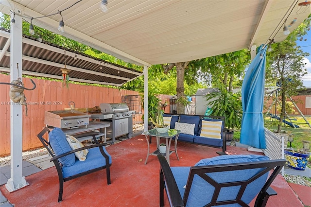 view of patio / terrace with outdoor lounge area and a grill