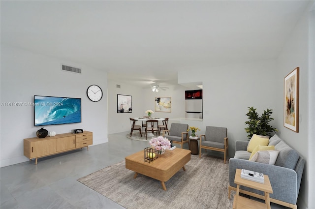 living room with ceiling fan