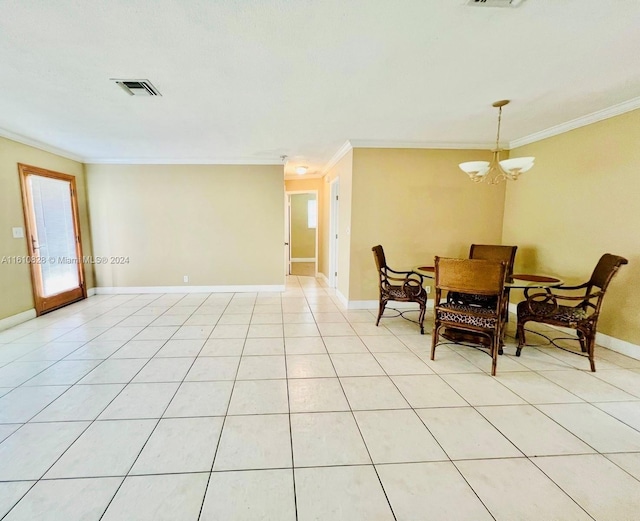 dining room featuring an inviting chandelier, crown molding, and light tile patterned floors