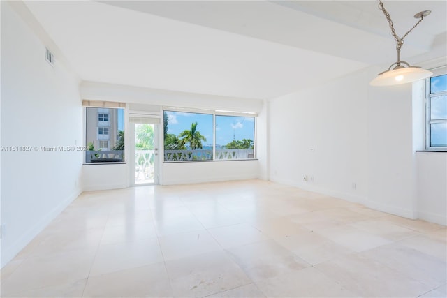 view of tiled spare room