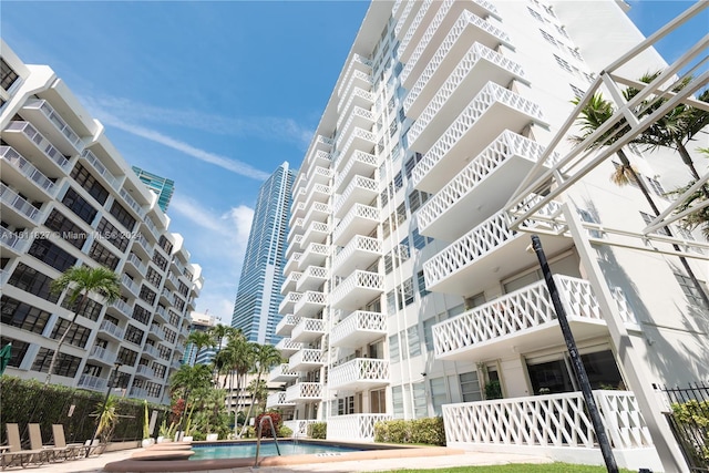 view of property with a community pool