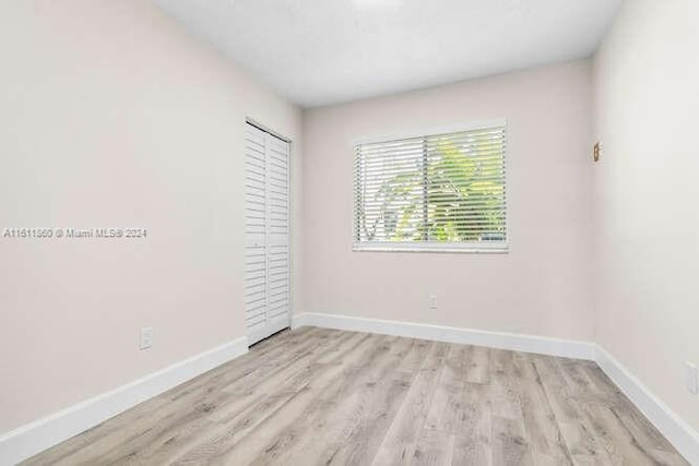 empty room featuring light wood-type flooring