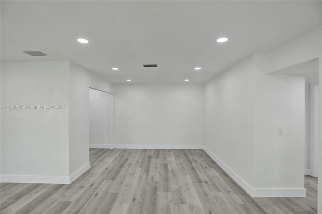 empty room with light wood-type flooring