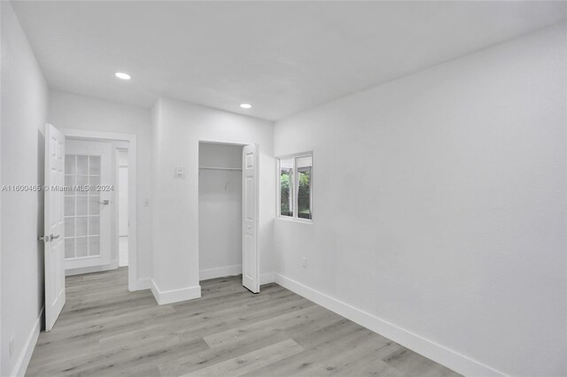 unfurnished bedroom featuring light hardwood / wood-style flooring