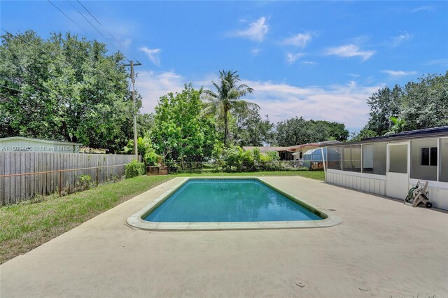 view of pool with a patio area