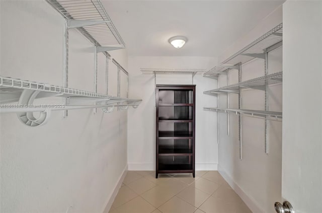 walk in closet featuring tile patterned floors