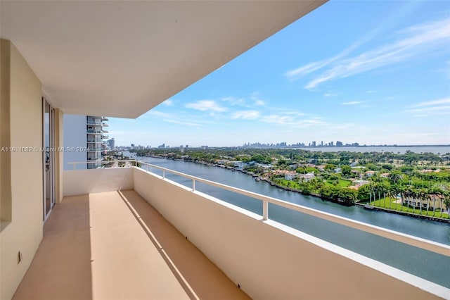 balcony featuring a water view