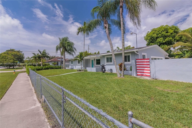 exterior space with a front yard