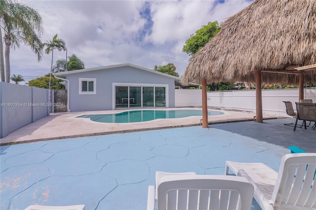 view of swimming pool featuring a patio area