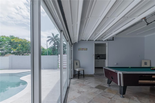 game room with tile floors and billiards