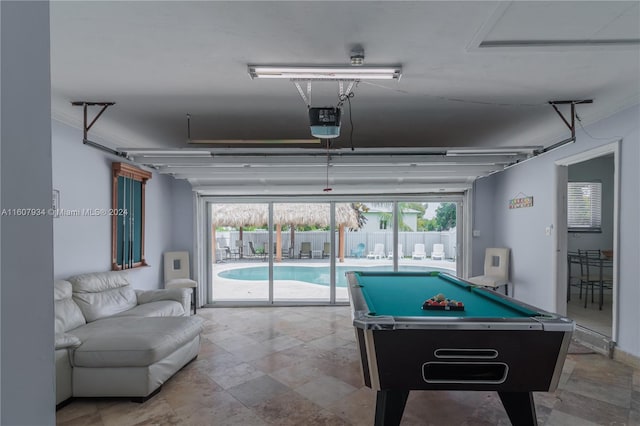 rec room featuring tile flooring, pool table, and ornamental molding